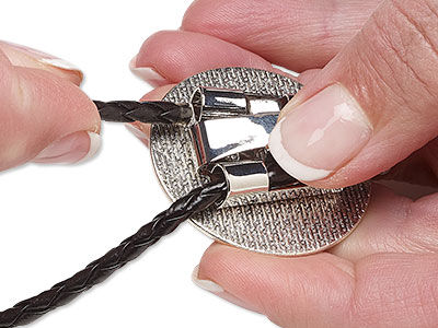 Threading bolo cord through slide